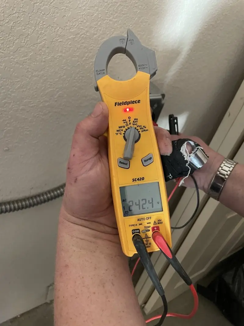 Voltage testing with clamp meter during Generator Installation in Brookline